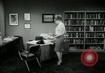Image of woman worker arguing with boss United States USA, 1965, second 56 stock footage video 65675073400