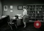 Image of woman worker arguing with boss United States USA, 1965, second 58 stock footage video 65675073400