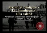 Image of Newly arriving immigrants to America  Ellis Island New York USA, 1906, second 4 stock footage video 65675073417