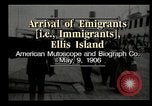 Image of Newly arriving immigrants to America  Ellis Island New York USA, 1906, second 6 stock footage video 65675073417