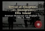 Image of Newly arriving immigrants to America  Ellis Island New York USA, 1906, second 9 stock footage video 65675073417