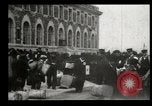 Image of Newly arriving immigrants to America  Ellis Island New York USA, 1906, second 18 stock footage video 65675073417