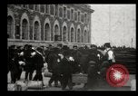 Image of Newly arriving immigrants to America  Ellis Island New York USA, 1906, second 32 stock footage video 65675073417