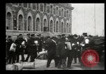 Image of Newly arriving immigrants to America  Ellis Island New York USA, 1906, second 34 stock footage video 65675073417