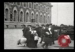Image of Newly arriving immigrants to America  Ellis Island New York USA, 1906, second 54 stock footage video 65675073417