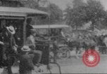 Immagine di La folla che arrivano a evento esterno United States USA, 1905, secondo 37 filmato di repertorio 65675073425