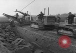 Image of tractor plows Holland Netherlands, 1954, second 6 stock footage video 65675073518