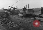 Image of tractor plows Holland Netherlands, 1954, second 7 stock footage video 65675073518