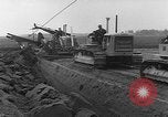 Image of tractor plows Holland Netherlands, 1954, second 8 stock footage video 65675073518