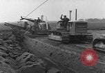 Image of tractor plows Holland Netherlands, 1954, second 9 stock footage video 65675073518