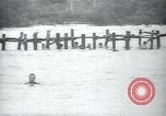 Standbild Underwater demolition Team Balikpapan Borneo Indonesien, 1945, aus Sekunde 58 historischem Filmmaterial Videoclip 65675073846