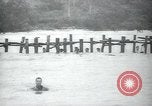 Standbild Underwater demolition Team Balikpapan Borneo Indonesien, 1945, aus Sekunde 59 historischem Filmmaterial Videoclip 65675073846