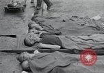 Image of emaciated corpses Germany, 1945, second 7 stock footage video 65675073860