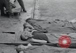 Image of emaciated corpses Germany, 1945, second 12 stock footage video 65675073860