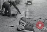 Image of emaciated corpses Germany, 1945, second 13 stock footage video 65675073860