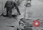 Image of emaciated corpses Germany, 1945, second 14 stock footage video 65675073860