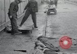 Image of emaciated corpses Germany, 1945, second 15 stock footage video 65675073860