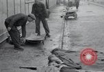 Image of emaciated corpses Germany, 1945, second 16 stock footage video 65675073860