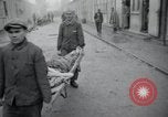 Image of emaciated corpses Germany, 1945, second 38 stock footage video 65675073860
