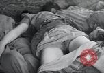 Image of dead bodies of inmates Germany, 1945, second 22 stock footage video 65675073862