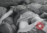 Image of dead bodies of inmates Germany, 1945, second 23 stock footage video 65675073862