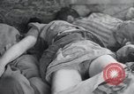Image of dead bodies of inmates Germany, 1945, second 25 stock footage video 65675073862