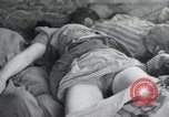 Image of dead bodies of inmates Germany, 1945, second 28 stock footage video 65675073862