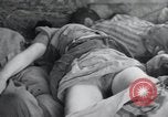 Image of dead bodies of inmates Germany, 1945, second 29 stock footage video 65675073862