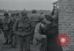 Image of German civilians view dead at Wöbbelin Concentration Camp Ludwigslust Germany, 1945, second 8 stock footage video 65675073876