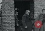 Image of German civilians view dead at Wöbbelin Concentration Camp Ludwigslust Germany, 1945, second 18 stock footage video 65675073876