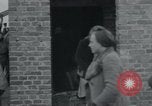 Image of German civilians view dead at Wöbbelin Concentration Camp Ludwigslust Germany, 1945, second 21 stock footage video 65675073876