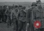 Image of German civilians view dead at Wöbbelin Concentration Camp Ludwigslust Germany, 1945, second 58 stock footage video 65675073876