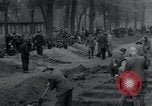 Image of German civilians bury Wobbelin victims Ludwigslust Germany, 1945, second 15 stock footage video 65675073877
