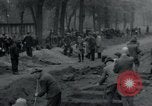 Image of German civilians bury Wobbelin victims Ludwigslust Germany, 1945, second 16 stock footage video 65675073877