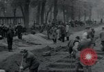 Image of German civilians bury Wobbelin victims Ludwigslust Germany, 1945, second 17 stock footage video 65675073877