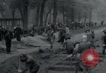 Image of German civilians bury Wobbelin victims Ludwigslust Germany, 1945, second 18 stock footage video 65675073877