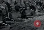 Image of German civilians bury Wobbelin victims Ludwigslust Germany, 1945, second 21 stock footage video 65675073877