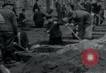 Image of German civilians bury Wobbelin victims Ludwigslust Germany, 1945, second 22 stock footage video 65675073877