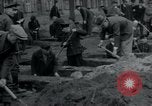 Image of German civilians bury Wobbelin victims Ludwigslust Germany, 1945, second 24 stock footage video 65675073877
