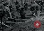 Image of German civilians bury Wobbelin victims Ludwigslust Germany, 1945, second 26 stock footage video 65675073877