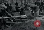Image of German civilians bury Wobbelin victims Ludwigslust Germany, 1945, second 27 stock footage video 65675073877