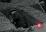 Image of German civilians bury Wobbelin victims Ludwigslust Germany, 1945, second 31 stock footage video 65675073877
