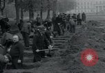 Image of German civilians bury Wobbelin victims Ludwigslust Germany, 1945, second 34 stock footage video 65675073877