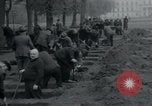 Image of German civilians bury Wobbelin victims Ludwigslust Germany, 1945, second 37 stock footage video 65675073877