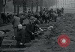 Image of German civilians bury Wobbelin victims Ludwigslust Germany, 1945, second 40 stock footage video 65675073877
