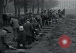 Image of German civilians bury Wobbelin victims Ludwigslust Germany, 1945, second 41 stock footage video 65675073877