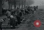 Image of German civilians bury Wobbelin victims Ludwigslust Germany, 1945, second 42 stock footage video 65675073877