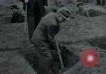 Image of German civilians bury Wobbelin victims Ludwigslust Germany, 1945, second 52 stock footage video 65675073877