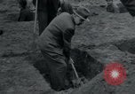 Image of German civilians bury Wobbelin victims Ludwigslust Germany, 1945, second 56 stock footage video 65675073877
