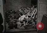 Image of pile of emaciated corpses Germany, 1945, second 11 stock footage video 65675073907